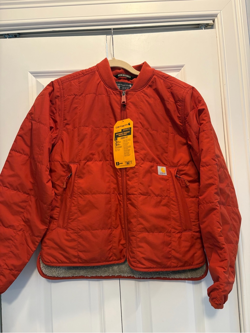 Carhartt women’s burnt Orange rain defender lightweight insulated Jacket